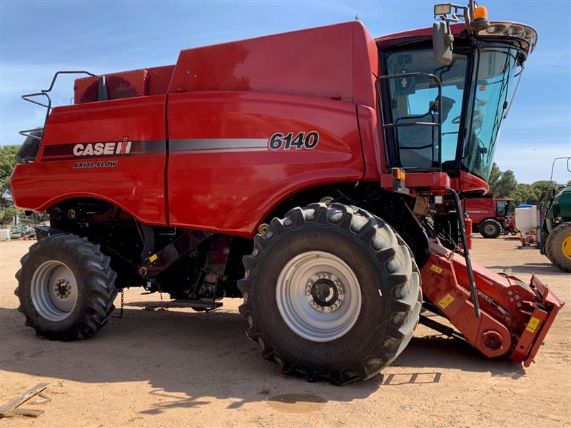 Photo 4. Case IH 6140 Axial Flow Combine & MacDon FD135 Front