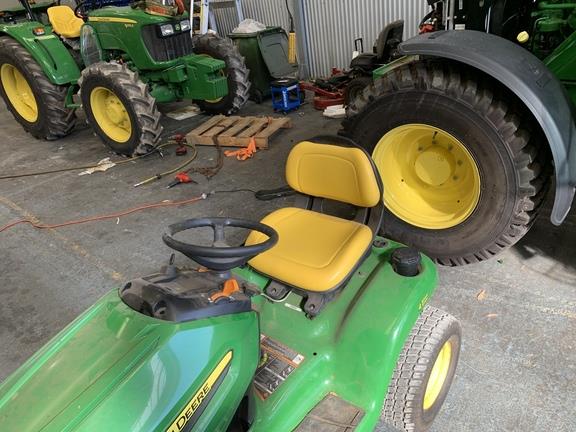 Photo 2. John Deere X304 lawn mower