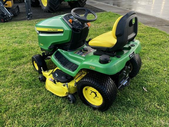 Photo 3. John Deere X324 ride on mower