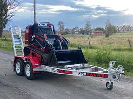 Photo 2. Toro TX1000 Skid Steer Loader