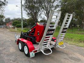 Photo 3. Toro TX1000 Skid Steer Loader