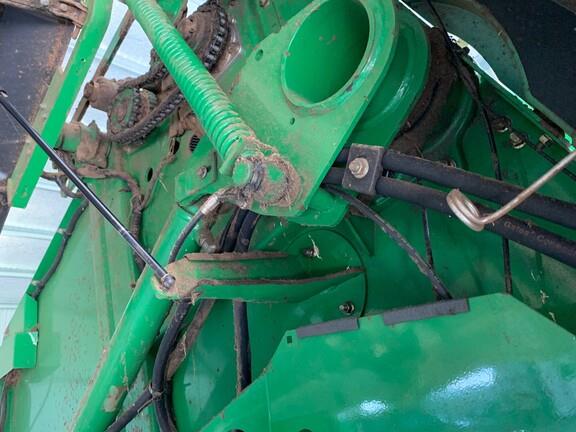 Photo 2. John Deere 854 Silage Special round baler