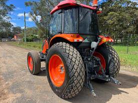 Photo 3. Kubota M9540 tractor