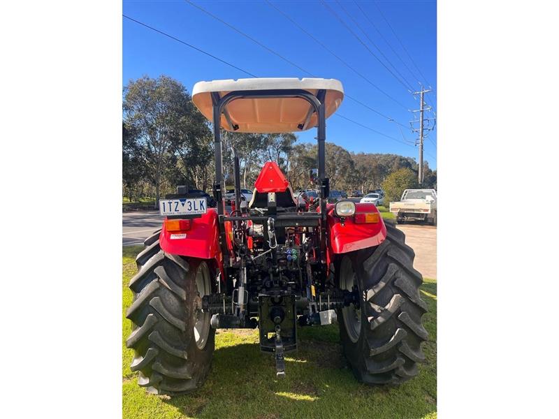 Photo 5. Case IH JXM 90 tractor with Challenge loader