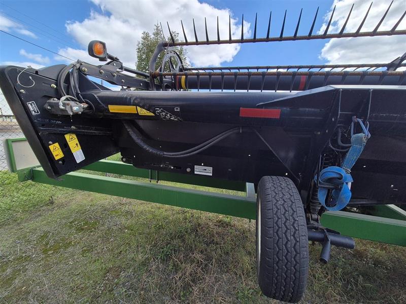 Photo 2. Macdon D65 harvester front