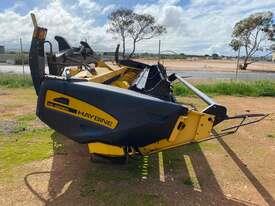 Photo 2. New Holland Haybine HS16 with Miller Nitro mount