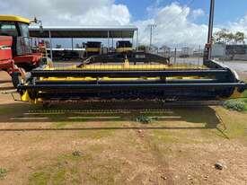 Photo 3. New Holland Haybine HS16 with Miller Nitro mount