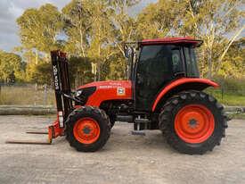 Photo 2. Kubota M8540 FWA/4WD Tractor