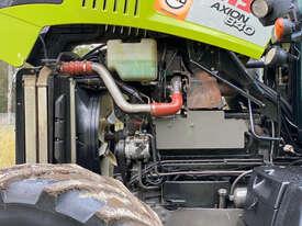 Photo 2. Claas Axion 840 FWA/4WD Tractor