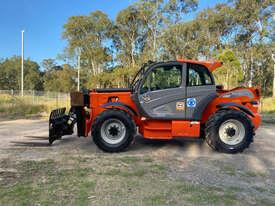 Photo 2. Manitou MT-X 1440 Telescopic Handler