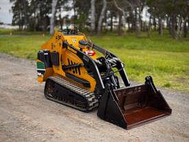 Photo 2. Vermeer S800TX Skid Steer Loader