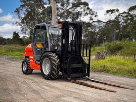 Photo 2. Manitou MH25-4T All/Rough Terrain Forklift