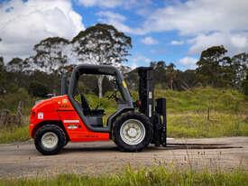 Photo 3. Manitou MH25-4T All/Rough Terrain Forklift