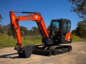 Photo 2. Doosan DX60E Tracked-Excav Excavator