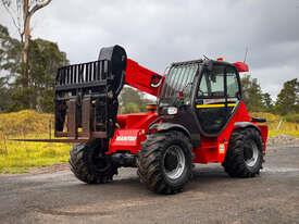 Photo 2. Manitou MHT-X 780 T Telescopic Handler