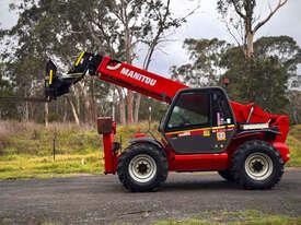 Photo 3. Manitou MT1440 Telescopic Handler