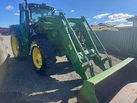 Photo 2. John Deere 6150M row crop tractor