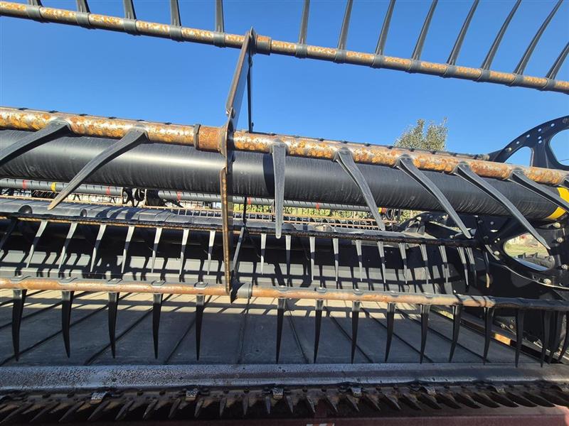 Photo 2. Macdon D65 harvester front