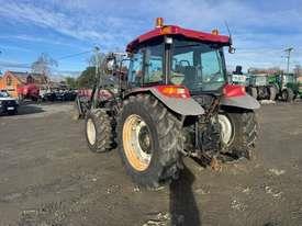 Photo 3. Case IH JX1080U Utility tractor