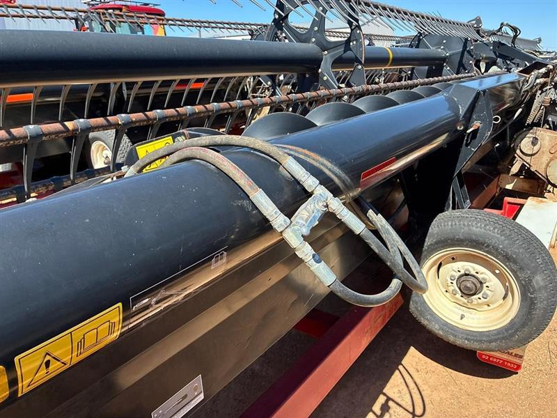 Photo 2. Macdon D65 harvester front