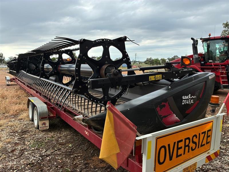 Photo 3. Macdon DXL145 harvester front
