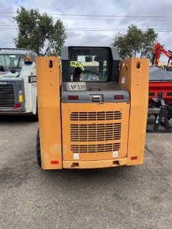 Photo 4. Case 430 skid steer loader