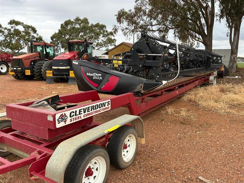 Photo 5. Macdon DXL145 harvester front