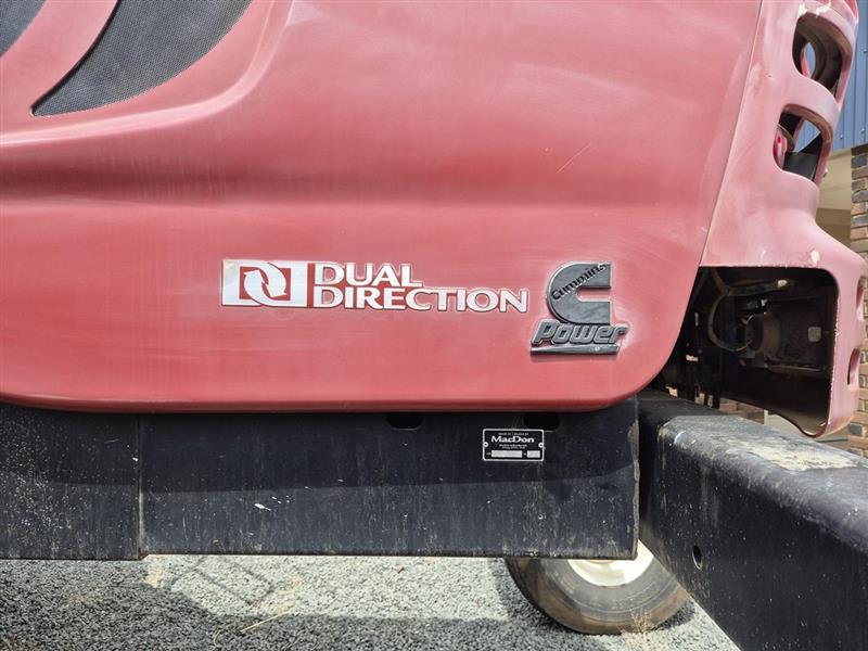 Photo 3. MacDon M205 windrower