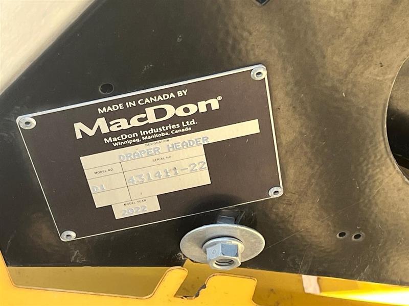 Photo 5. Macdon D125 harvester front