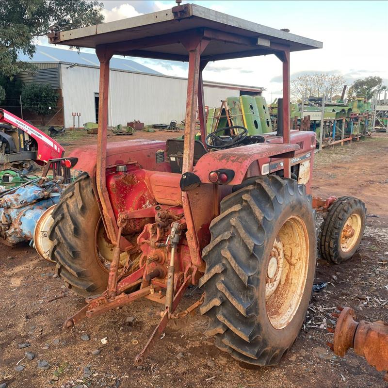 Photo 3. International 484 Tractor