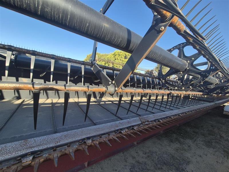 Photo 4. Macdon D65 harvester front