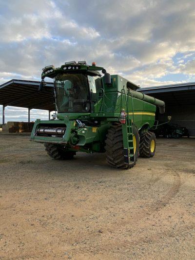 Photo 5. John Deere S790, 740D & trailer package combine harvester